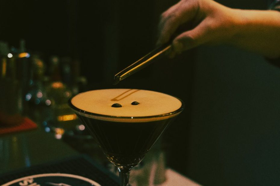 Photo by Ayberk Mirza: https://www.pexels.com/photo/close-up-of-a-bartender-putting-coffee-beans-on-espresso-martini-cocktail-15750737/